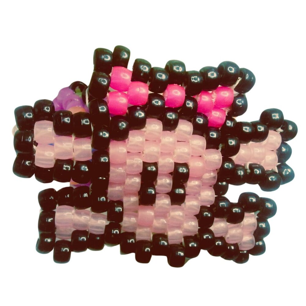 Glow-n-Dark Pink Large skull  On a Glow Kandi Cuff EDM Stretchy Bracelet